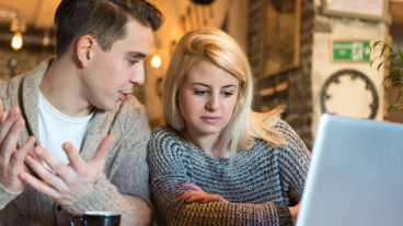 Two learners at laptop